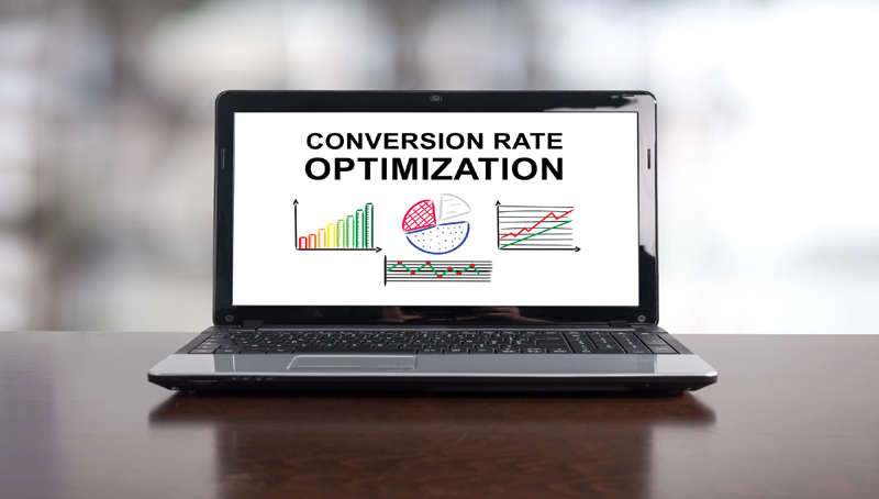 Laptop displaying conversion rate optimization charts